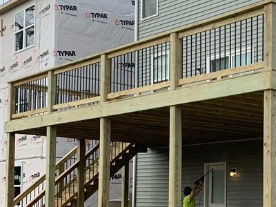 Second-story deck with stairs on a new-construction home in Fern Creek