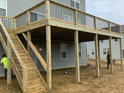 Raised treated pine deck with full-height stairs in Fern Creek KY