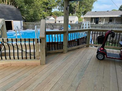 Deck built around an above-ground pool in Pleasure Ridge Park KY
