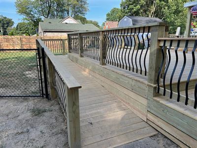 Wood deck ramp with handrail for a mobility scooter in Pleasure Ridge Park