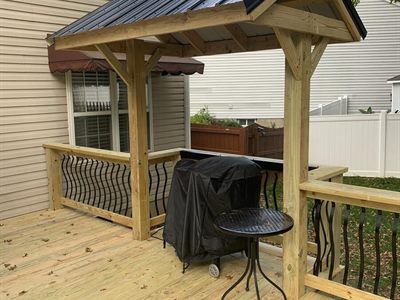 Grill gazebo with metal roof framed on a deck in Pleasure Ridge Park